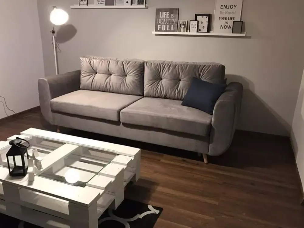 Kanapy I Sofy>NEXT COLLECTION Rozkładana szara sofa z funkcją spania AURA